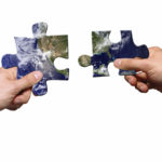Channel Marketing (image: hands holding pieces of jigsaw puzzle)