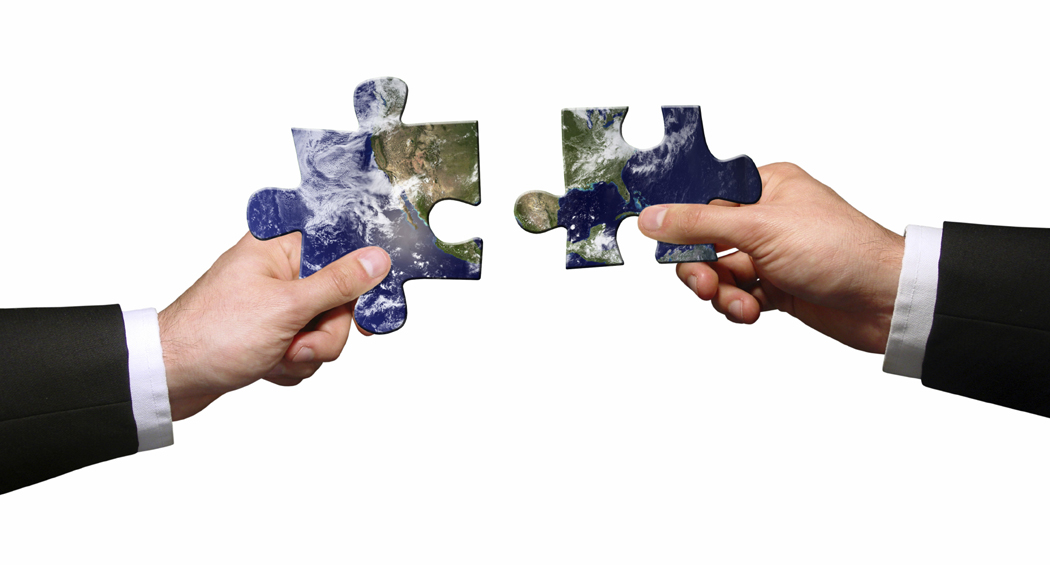 Channel Marketing (image: hands holding pieces of jigsaw puzzle)